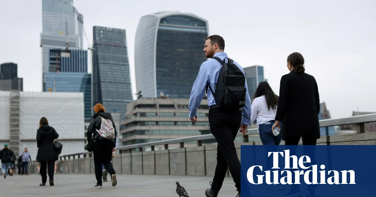 UK unemployment falls as wages growth hits lowest in two years