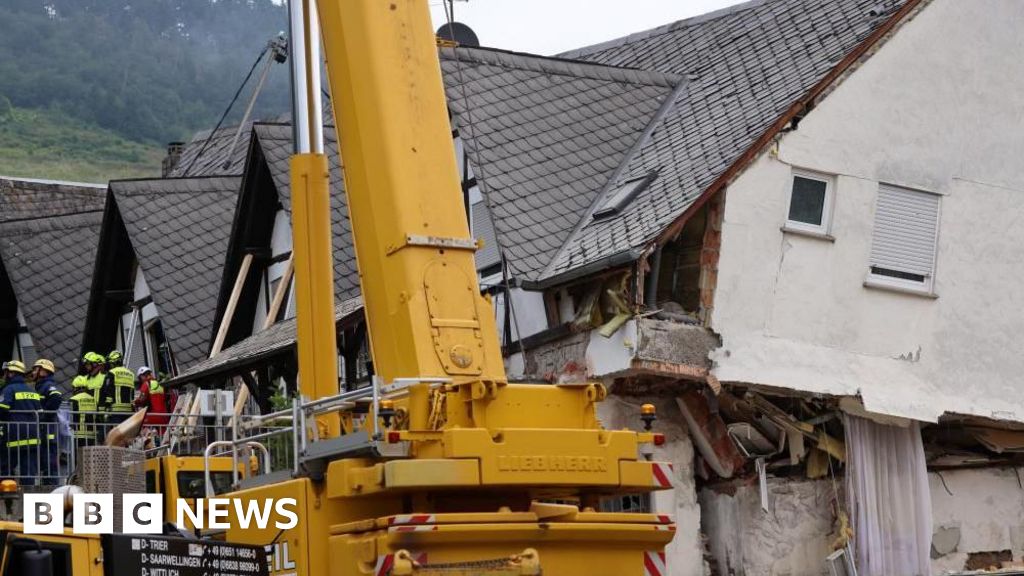 German hotel collapse kills two, trapping others under rubble