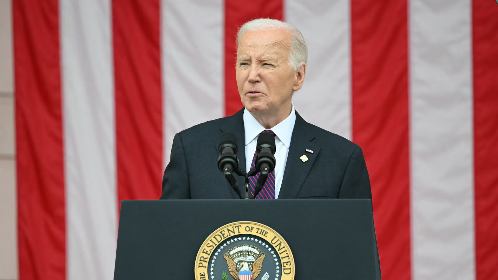 Biden Honors Fallen Soldiers and Veterans at Arlington, Contrasts with Trump's Controversial Memorial Day Posts